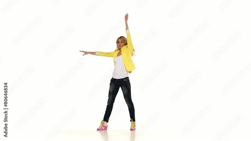 Modern style blond girl in yellow shirt dancing sexy-jazz on Modern style blond girl in yellow shirt dancing sexy-jazz on