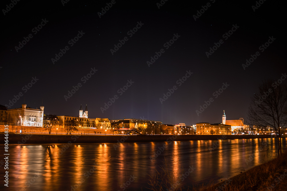 View of Magdeburg and the river Elbe at night with stars