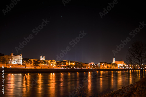 View of Magdeburg and the river Elbe at night with stars