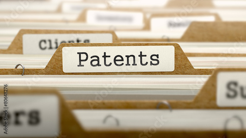 Patents Concept with Word on Folder. photo