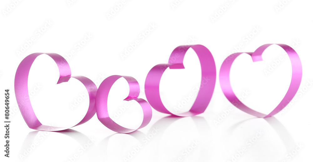 Purple hearts from ribbon isolated on white Purple hearts from ribbon isolated on white