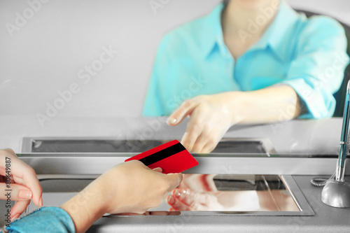 Teller window with working cashier