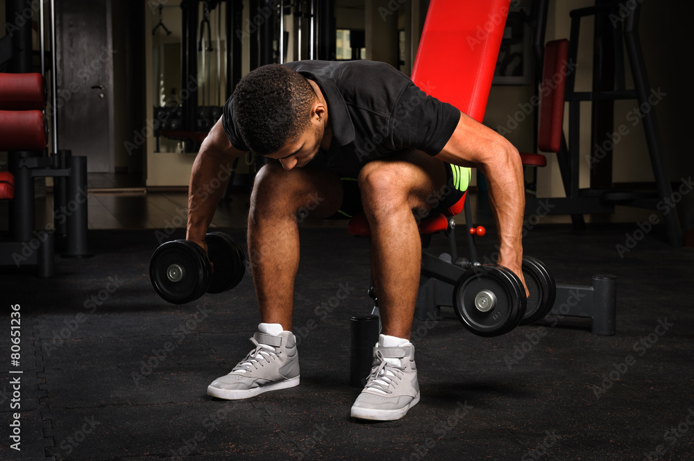 Seated reverse dumbbell fly instructions and video