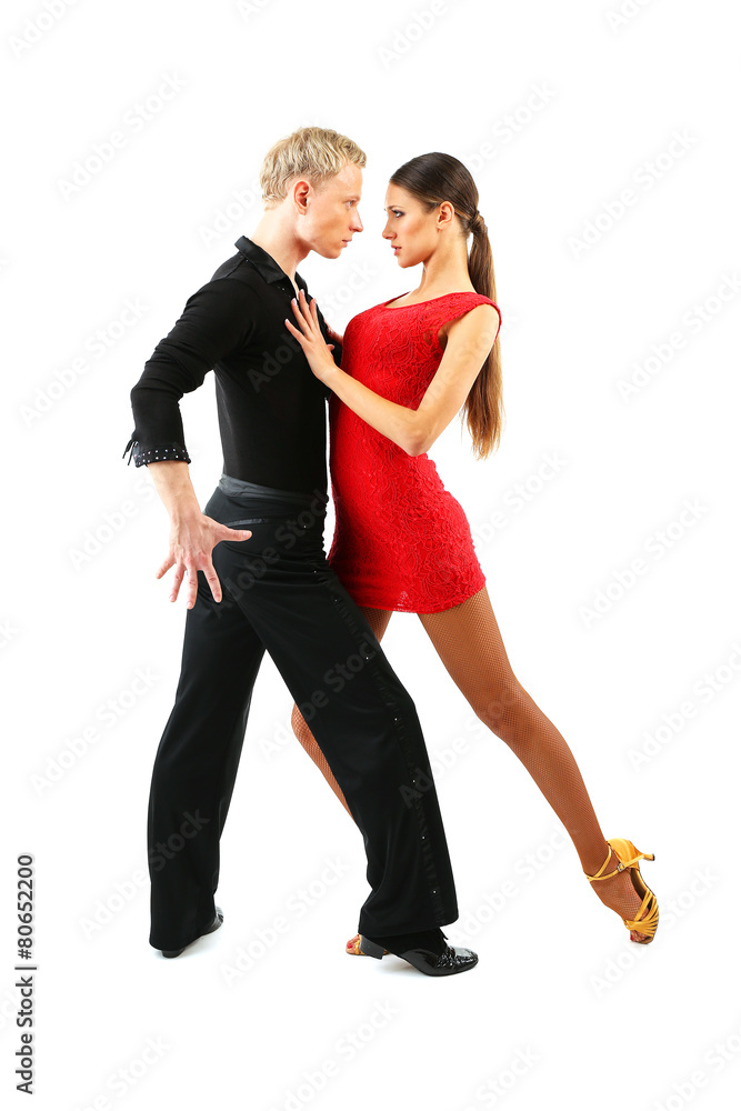 Beautiful couple of professional artists dancing isolated on white Beautiful couple of professional artists dancing isolated on white