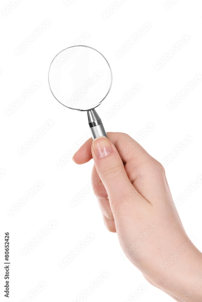 Female hand with magnifying glass isolated on white Female hand with magnifying glass isolated on white