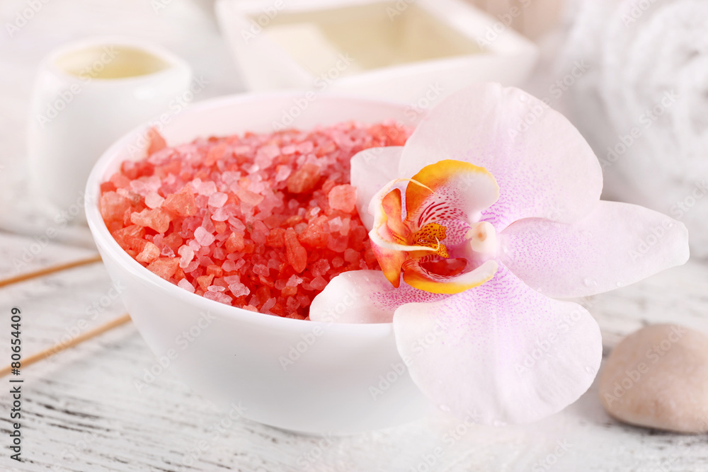 Spa still life with color sea salt on wooden table, closeup Spa still life with color sea salt on wooden table, closeup
