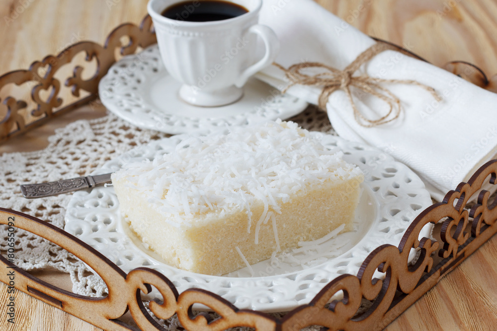 Brazilian dessert sweet couscous pudding coconut, cup of coffee