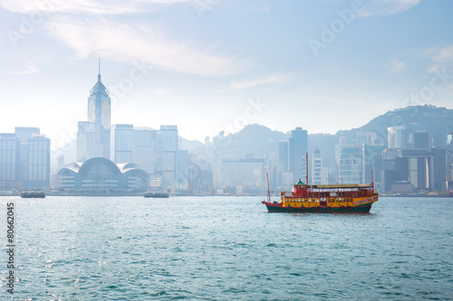 Ferry in Hong Kong with Victoria Harbour in background