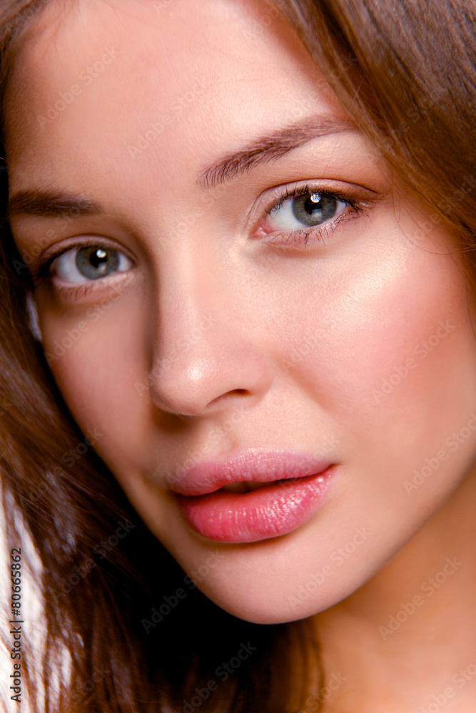 Close up portrait of beautiful young woman face. Isolated on Close up portrait of beautiful young woman face. Isolated on
