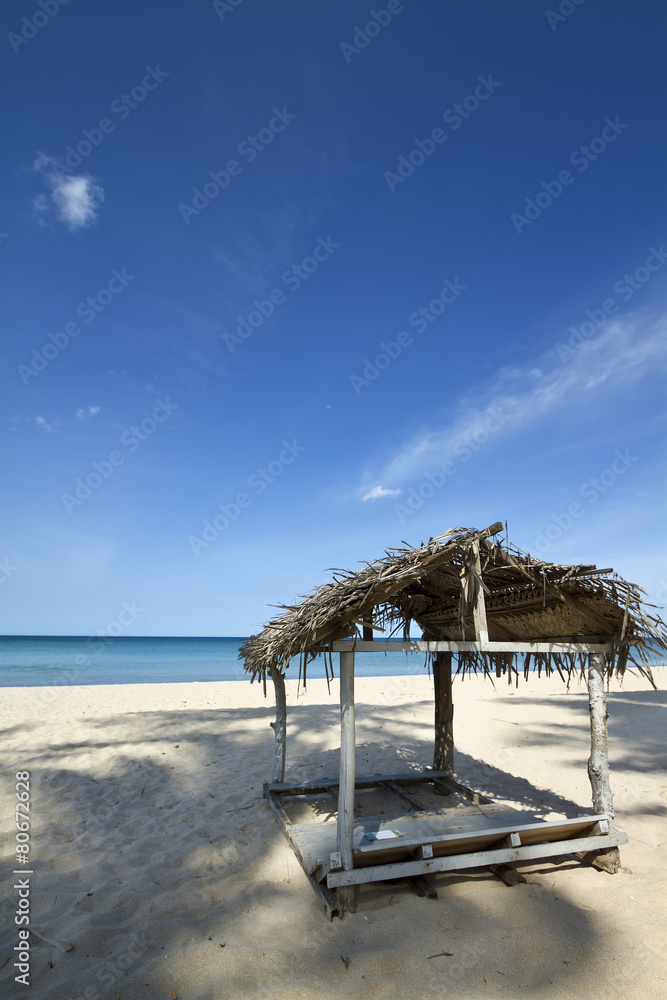 Hut in white sand beach