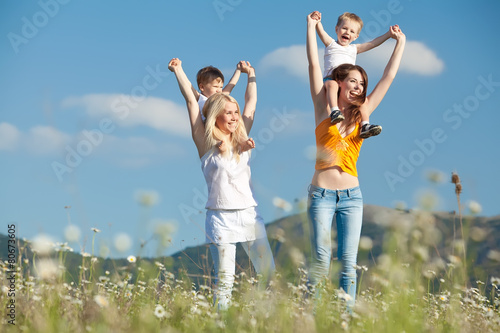 Women with there children are relaxing in nature