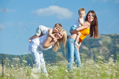 Women with there children are relaxing in nature