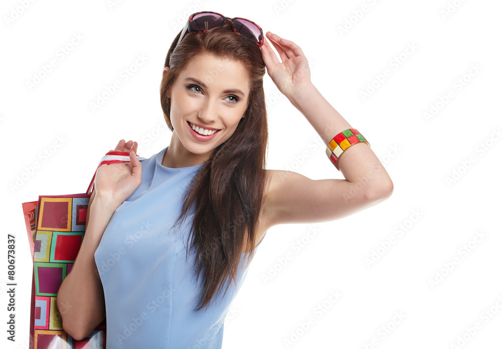 lovely woman with shopping bags over white