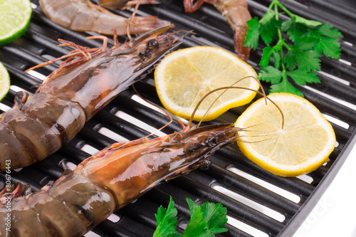 Fresh shrimps on a grill.