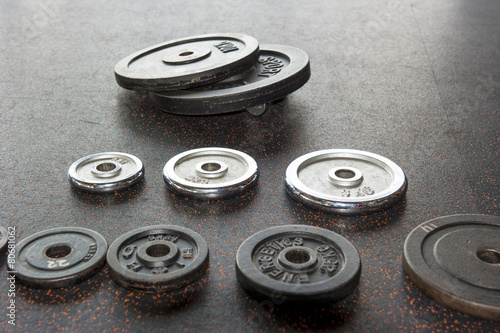 collection of dumbbell weight plates
