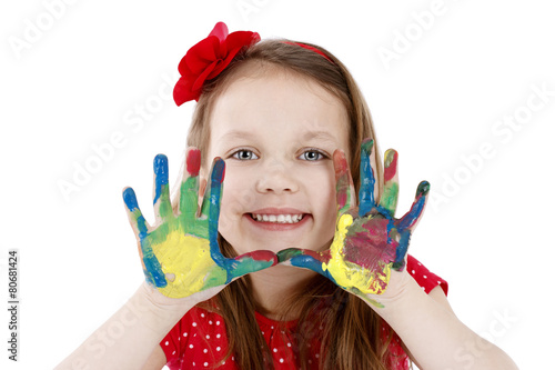 Cute little painter with dirty hands - isolated studio portrait