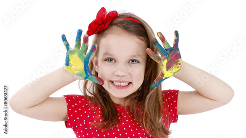 Funny little artist with dirty hands - isolated studio portrait