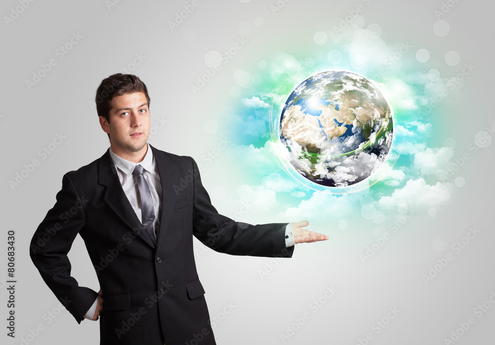 Young man with earth and cloud concept Young man with earth and cloud concept