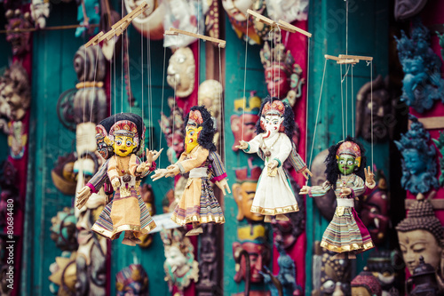 Masks, dolls and souvenirs in street shop at Durbar Square in Ka