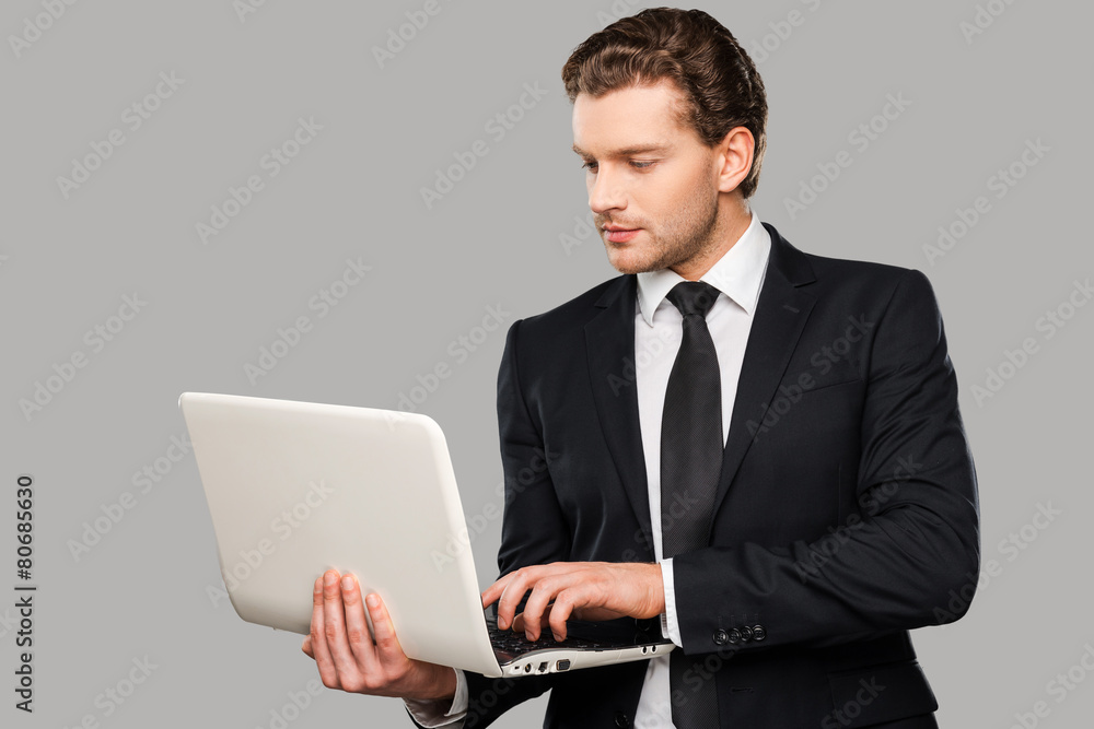Businessman with laptop. Businessman with laptop.