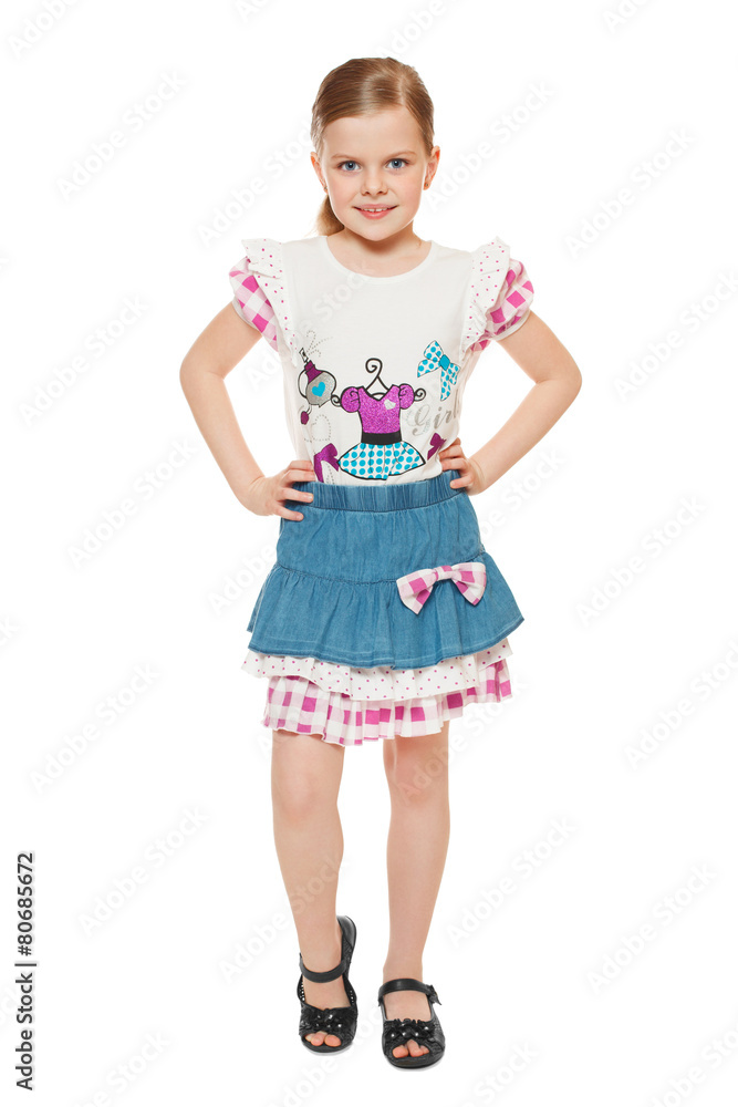 Fashionable little cute girl in shirt and skirt, full length Fashionable little cute girl in shirt and skirt, full length