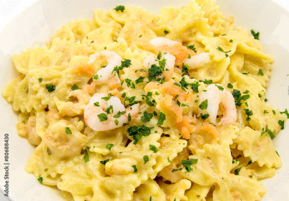italian pasta called butterflies with shrimp salmon and basil italian pasta called butterflies with shrimp salmon and basil