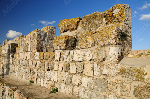 Part of Jerusalem old city wall with the embrasures.