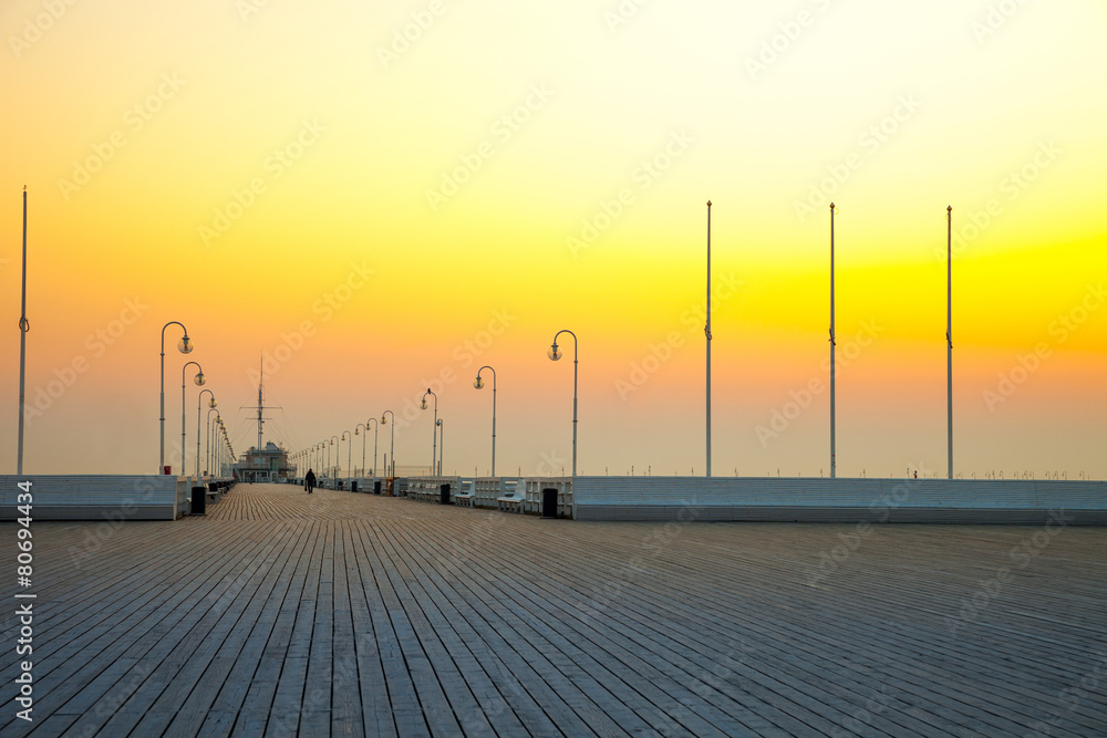 Sunrise at the pier in Sopot, Poland.