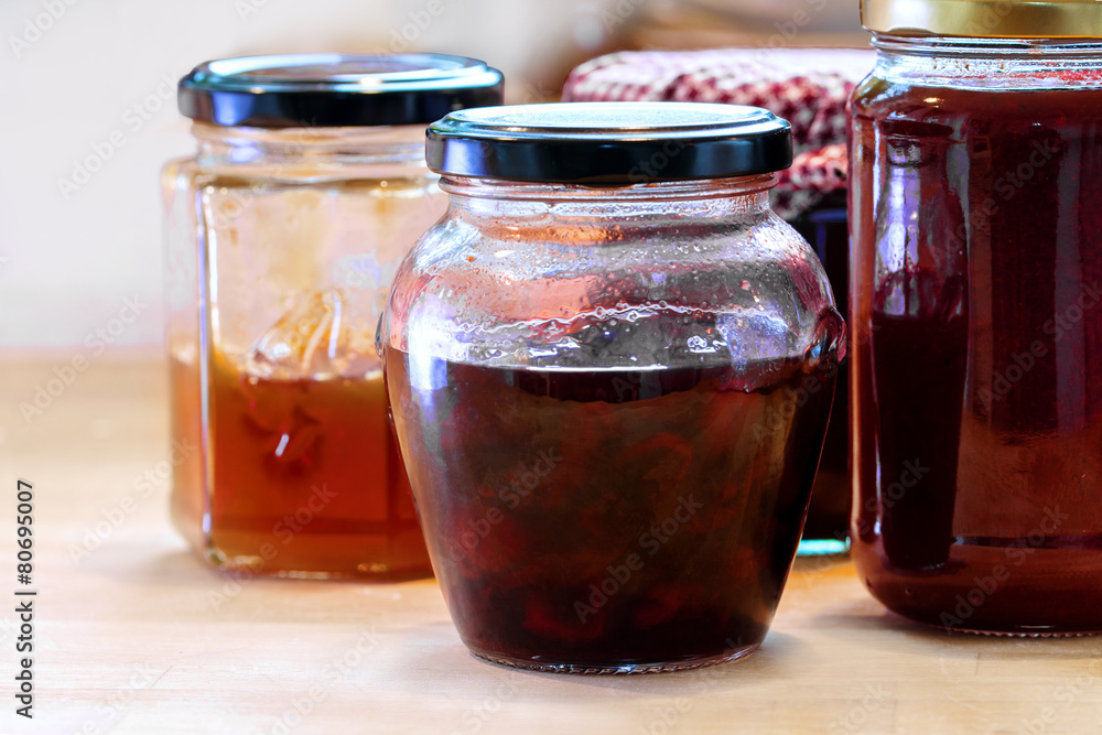 jars with various homemade fruit jam jars with various homemade fruit jam