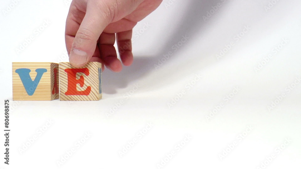 The video shows vector word built of wooden blocks The video shows vector word built of wooden blocks