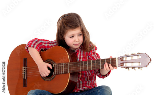 Pretty girl playing guitar