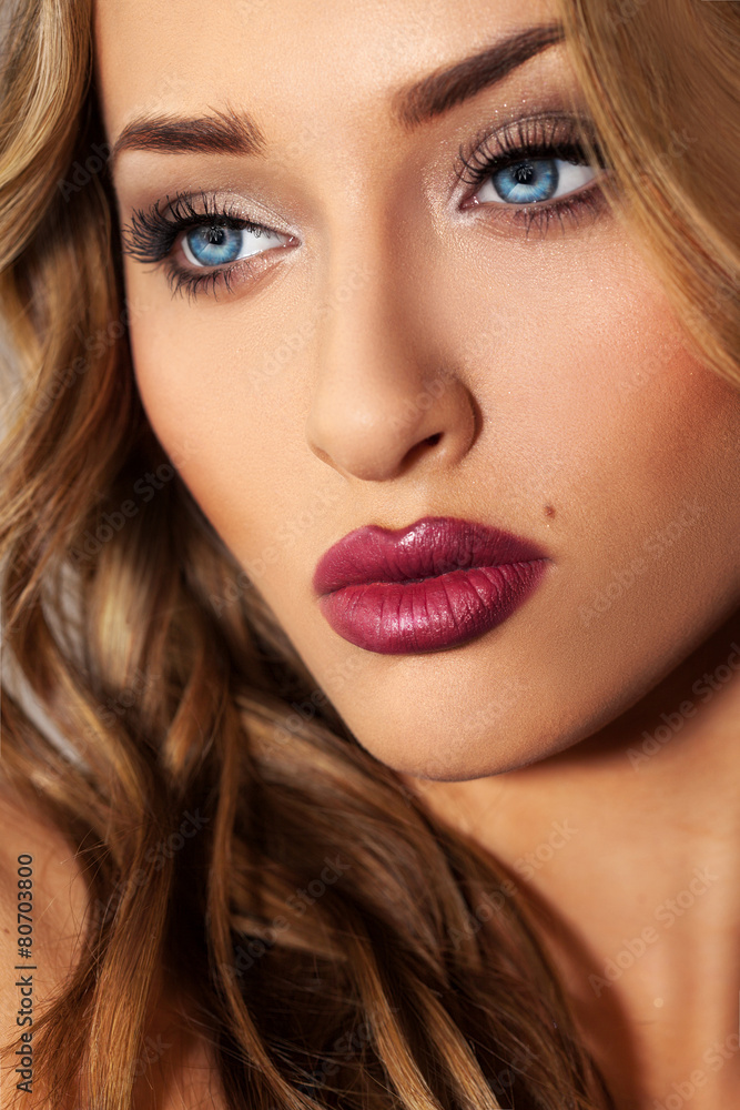 Close up studio portrait of beauty blonde girl with blue eyes Close up studio portrait of beauty blonde girl with blue eyes