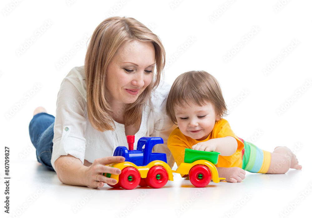 kid boy and mother play together with toy kid boy and mother play together with toy