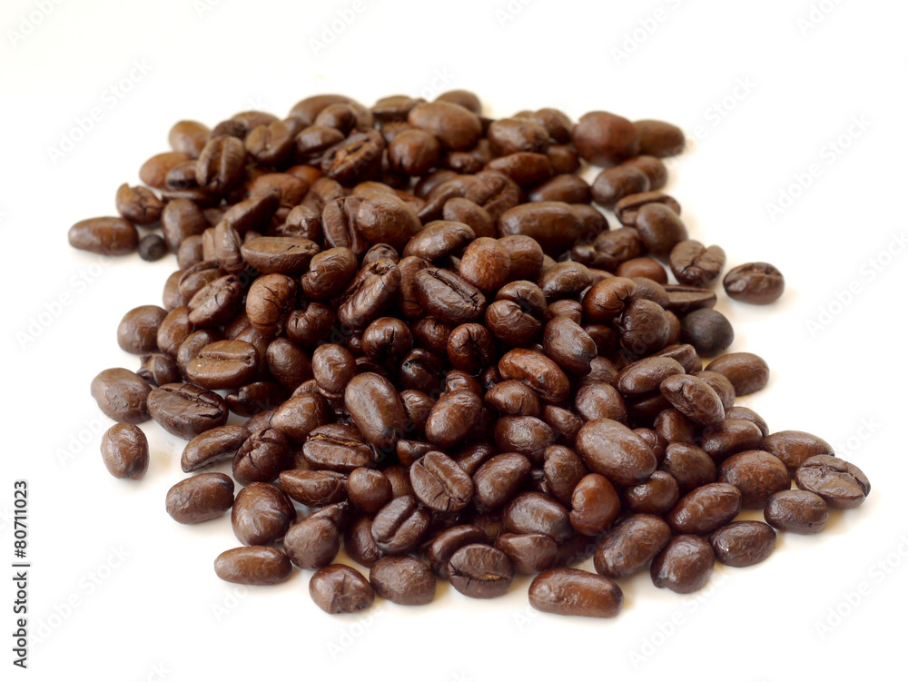 Brown coffee beans isolated on white background Brown coffee beans isolated on white background