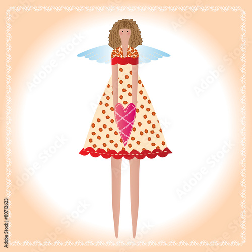 Tilda Angel Doll with fabric heart in hands.