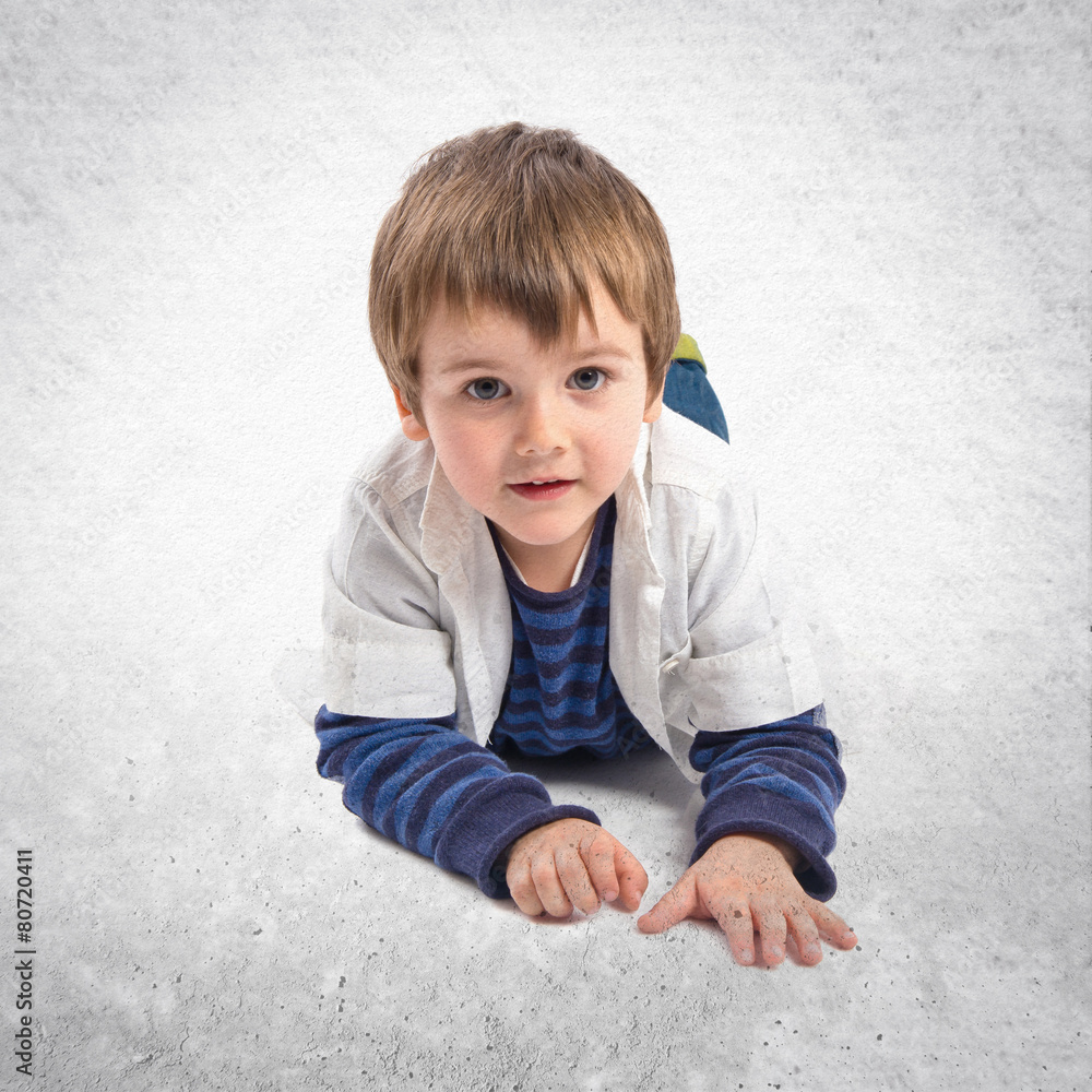 Boy pointing to the front over white background Boy pointing to the front over white background