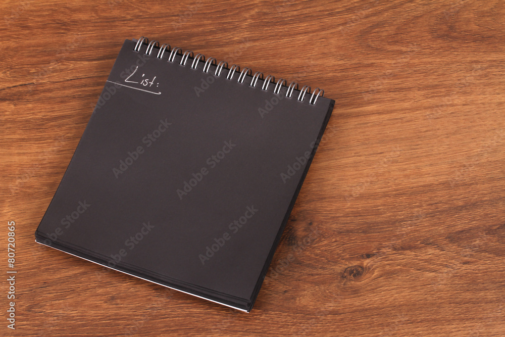 The Balck Notepad or black reminder on wood The Balck Notepad or black reminder on wood