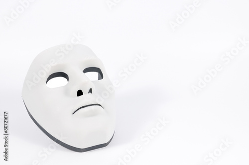 Black mask hidden behind white, human behaviour