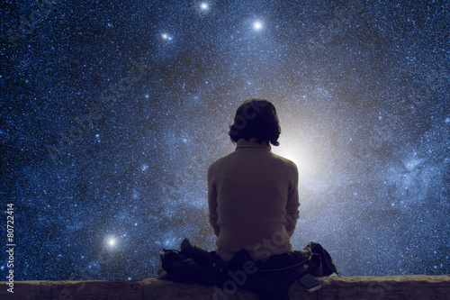 Girl watching the starry skies.