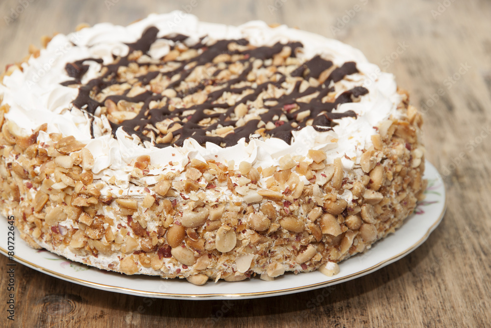 Cake with honey shortcakes, curd cream with nuts and chocolate. Cake with honey shortcakes, curd cream with nuts and chocolate.