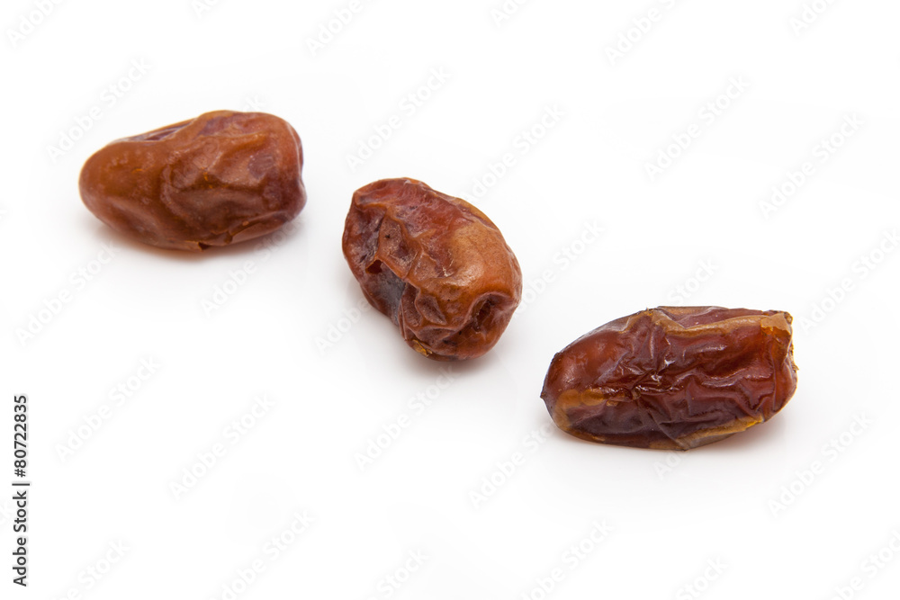 Medjool dates isolated on a white background. Medjool dates isolated on a white background.