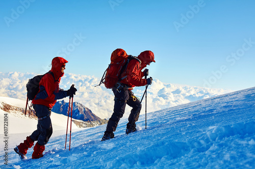climbers at the top of a pass