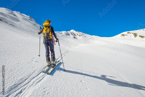 Girl makes ski mountaineering, Randonnee ski trails