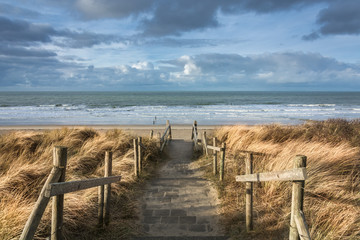 Fototapete Abstieg zum Strand Weiter Blick über die Nordsee  © julia700702