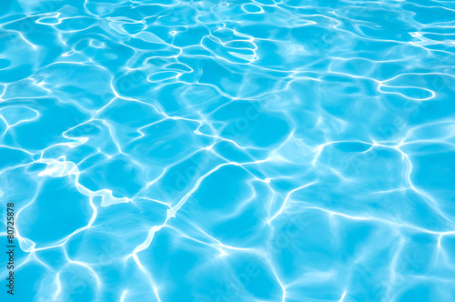 Bright water surface in swimming pool © peangdao