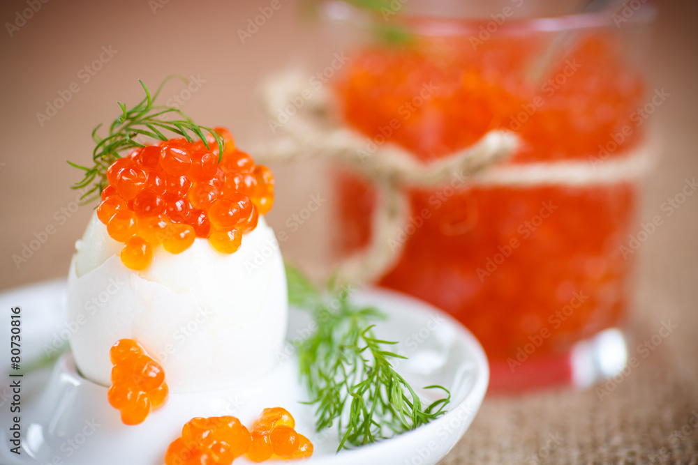 boiled egg with red caviar boiled egg with red caviar