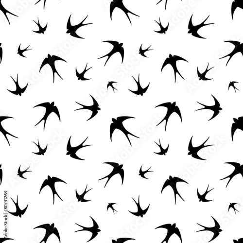 Seamless pattern with black swallows on white. Vector  © naddya