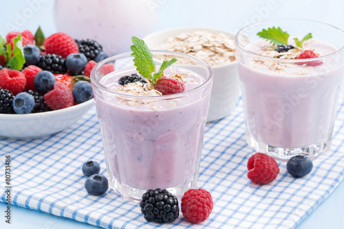 healthy berry smoothies with oatmeal in a glass