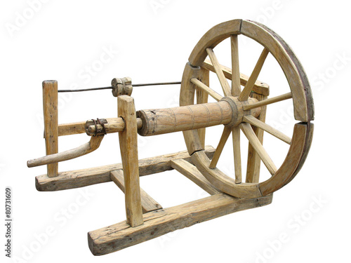 Old wooden spinning-wheel distaff isolated