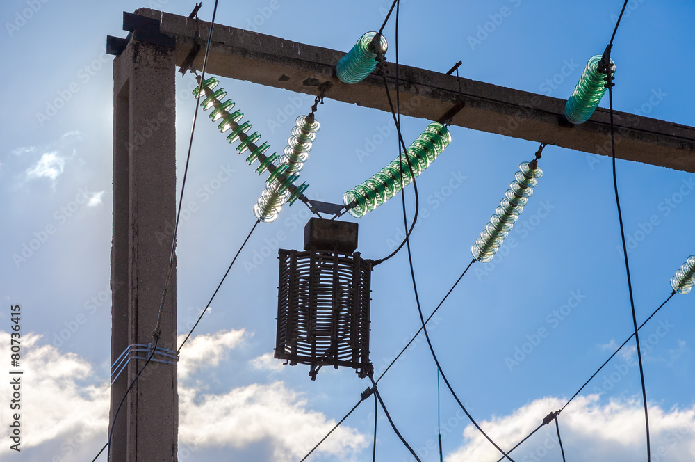 Power line wiring and insulators system over blue sky Power line wiring and insulators system over blue sky